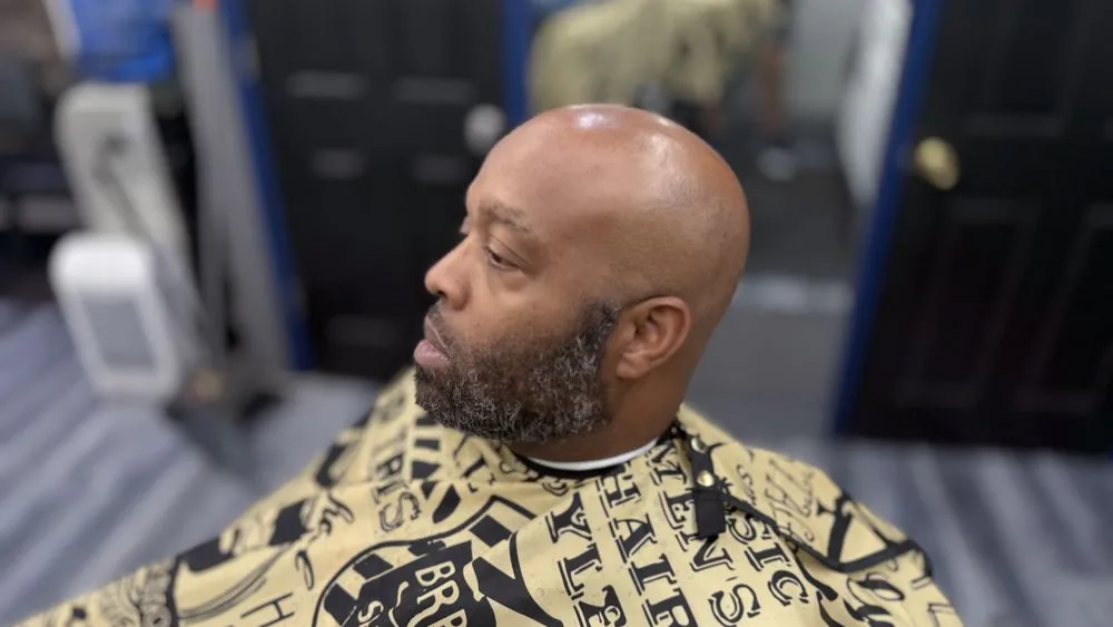 Client with low fade and styled top at Parma lounge.
