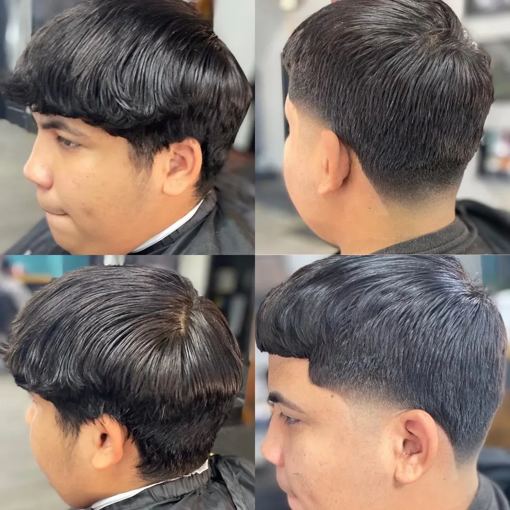 Client with fresh cut at Parma Premier Barber Lounge.